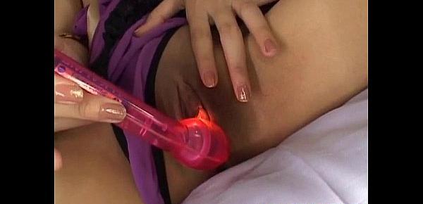  Rika Hayama pleasures her slit with vibrator
